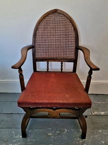 Early 20th century oak/rattan carver