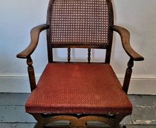 Early 20th century oak/rattan carver