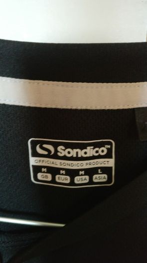 Black jersey, size M, new but no tags