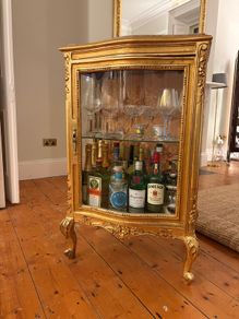 Gold antique drinks glass cabinet