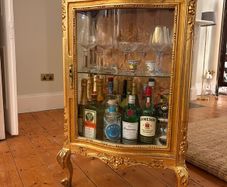 Gold antique drinks glass cabinet