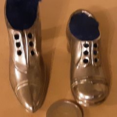 two nice white metal pin cushions