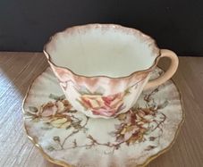 Antique Doulton Burslem Blush Ivory demitasse teacup and saucer set