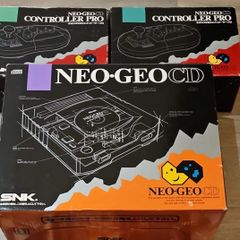 Neo Geo CD top loader + 2x boxed controllers