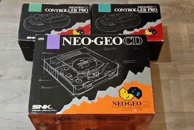 Neo Geo CD top loader + 2x boxed controllers
