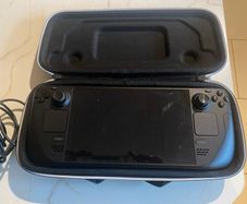 Steam Deck/ carry case and charger.