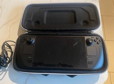 Steam Deck/ carry case and charger.