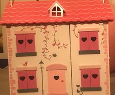 Wooden Dollhouse with Furniture in perfect condition