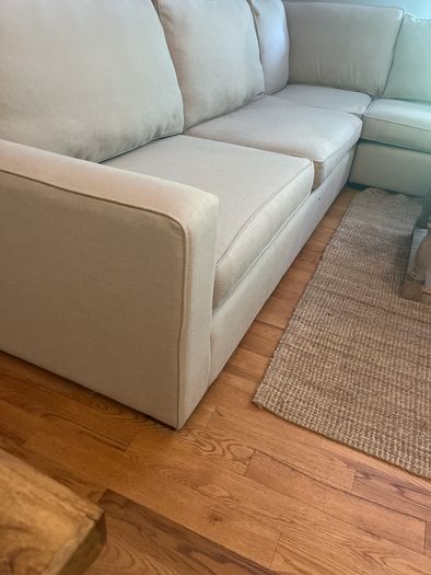 large L shaped cream sofa