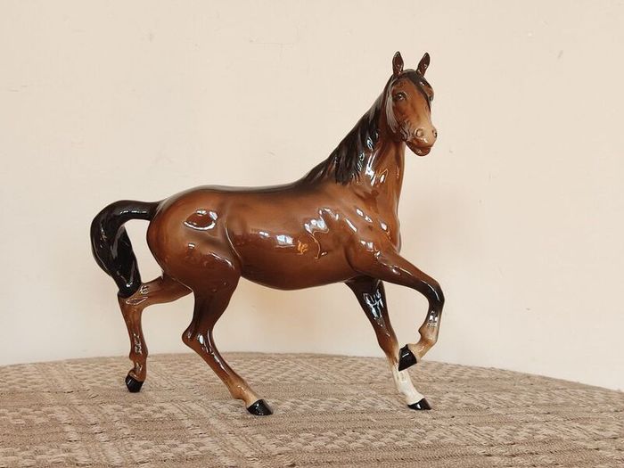 Vintage Royal Doultot porcelain horse. new in the box.