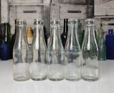 334 - Set of 5 Vintage Clear Glass Collectible Decorative MiWadi Bottles