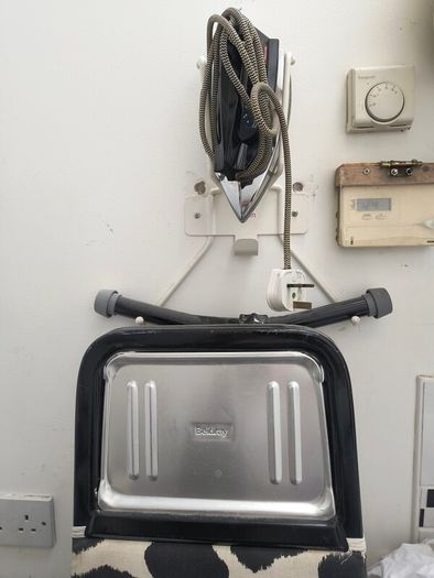 Iron  and ironing board Holder