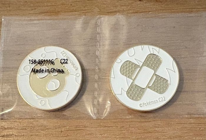 Pokemon Pins & Metallic Coins