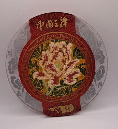Vintage Chinese fabric in a glass plate