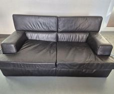 1 contempory leather sofa with arm chair
