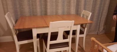 As new Extendable kitchen table and soft padded chairs