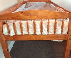 Pine mid-sleeper bed with storage shelf