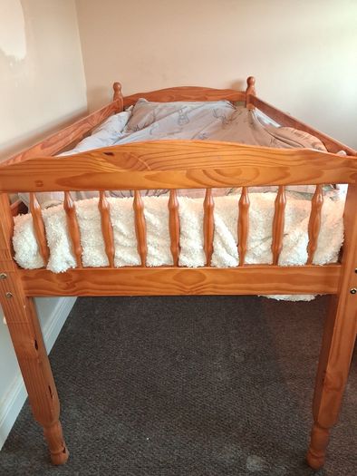 Pine mid-sleeper bed with storage shelf