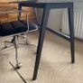 Industrial Style Desk: Distressed Concrete on Black Steel Base Image 2