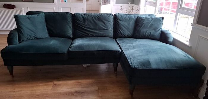 Green L shaped velvet couch. Reduced to 500