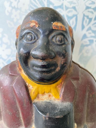 Original Cast Iron Uncle Moses Money box.