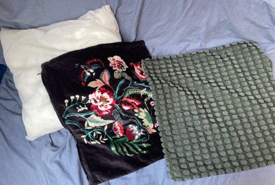 Cushion pad and two covers
