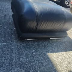black leather footstool