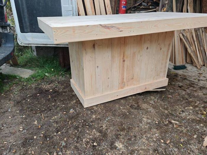 Rustic kitchen island with triple overhang