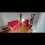 red single sofa with wheels Image 2