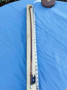 Vintage mounted Cello bow on gilded board