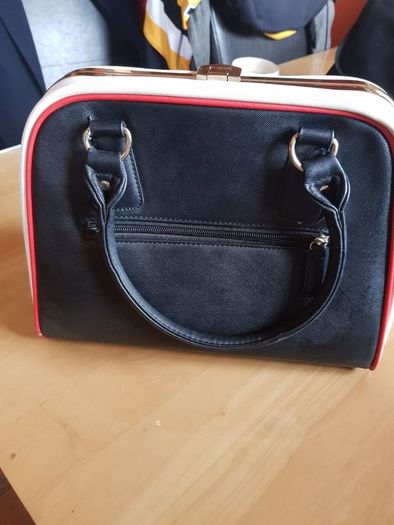 ladies black and cream handbag