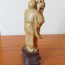 Hand-carved Chinese soapstone statue of Shou Lao the Taoist God of Longevity resting on a separate dark stone pedestal  early 20th century  height 15.5cm Image 3