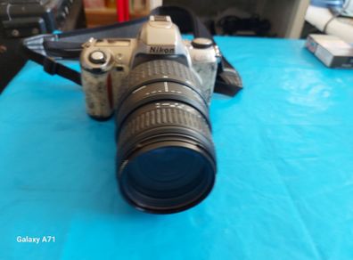 NIKON N65 Film Camera in excellent condition and a Japanese made lens