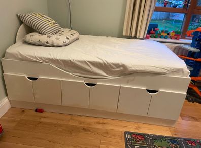 Child storage bed or small bedroom couch.