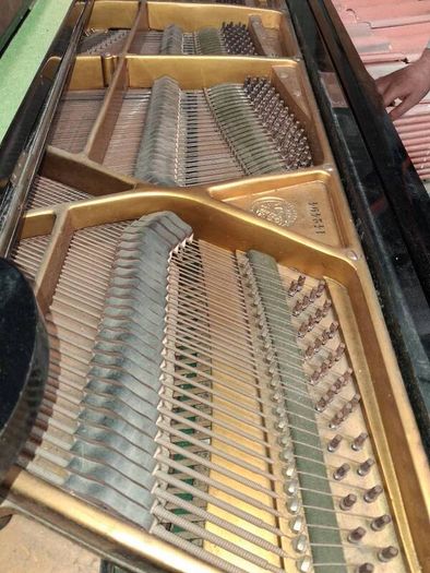 C. Bechstein baby grand piano