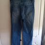 Mid-wash Distressed Jeans with Cuffed Hem. Image 6