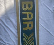 Gold framed bar sign