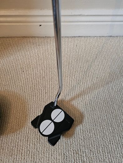 Odyssey broomstick putter.