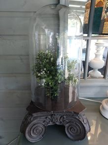 Bell jar and base with faux plant.