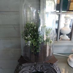 Bell jar and base with faux plant.