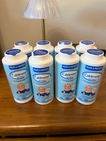 8 bottles of caldesene baby powder
