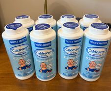 8 bottles of caldesene baby powder