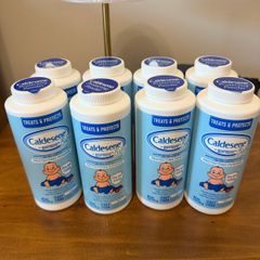 8 bottles of caldesene baby powder