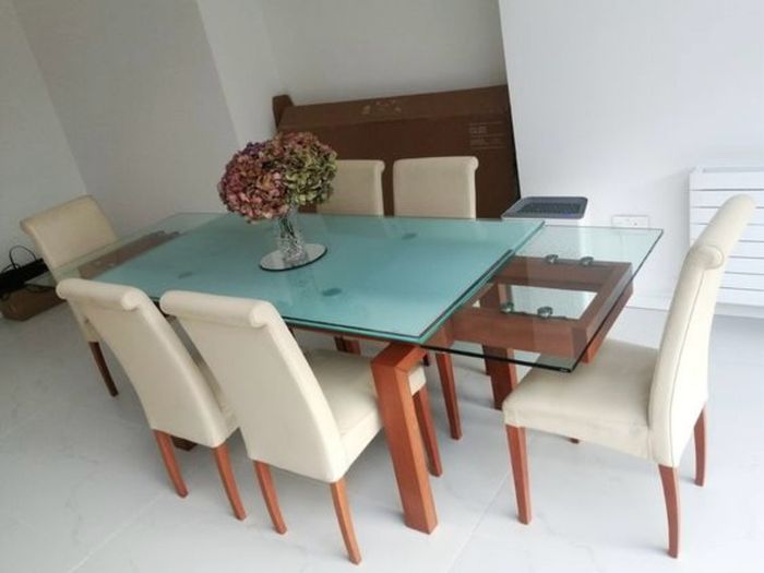 Calligaris Extendable dining table and leather chairs