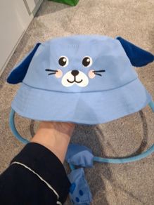 Brand New with tags 'Press my paws to move my ears' Sun hat Age 7-9 years