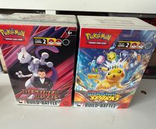 Sealed Destined Rivals and Surging Sparks Build and Battle boxes Pokemon cards