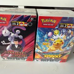 Sealed Destined Rivals and Surging Sparks Build and Battle boxes Pokemon cards