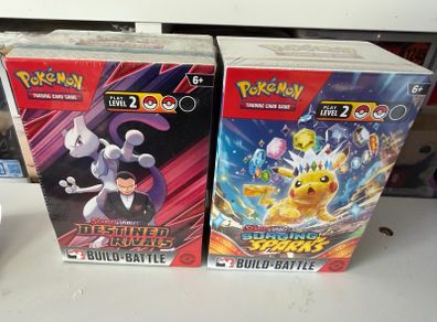 Sealed Destined Rivals and Surging Sparks Build and Battle boxes Pokemon cards