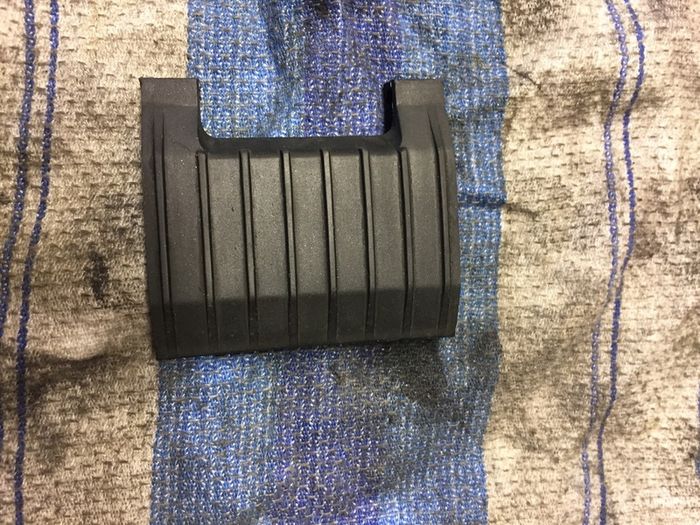 Rear brake caliper dust cover