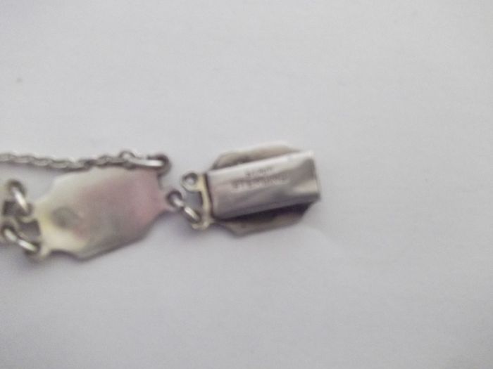 a vintage silver and enamel bracelet